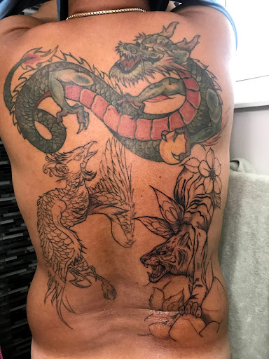 Tattoo Shop «No Hard Feelings Tattoo Gallery», reviews and photos, 10331 W Sample Rd, Coral Springs, FL 33065, USA