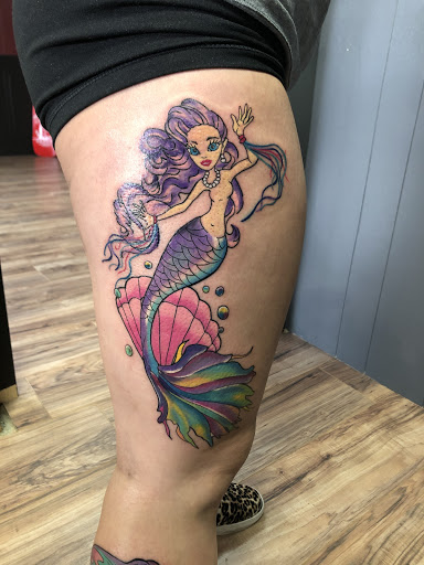 Explore lower sleeve tattoo ideas, creative tattoo ideas in Lewiston, available at Artistic Soul Tattoos