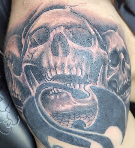 Explore unicorn tattoo ideas, creative tattoo ideas in Angola, available at Hoodlum Ink