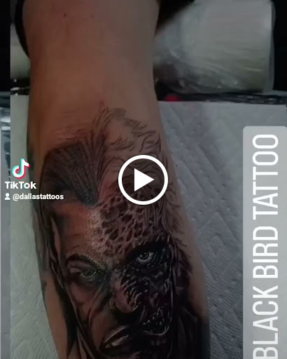 Find leg tattoo ideas for guys for your next unique tattoo in Rensselaer at Black Bird Tattoo