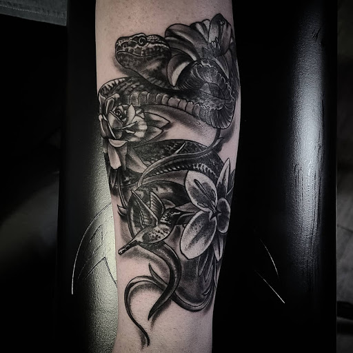 Explore light bulb tattoo ideas, creative tattoo ideas in Midlothian, available at Rivermore Tattoo
