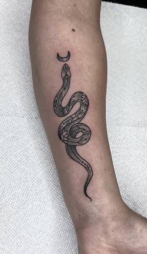 Explore child tattoo ideas, creative tattoo ideas in Schaumburg, available at Urban Rebels Ink