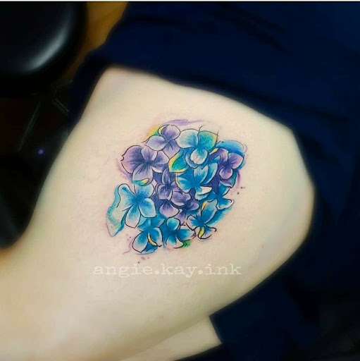 Explore baby foot print tattoo ideas, creative tattoo ideas in Casper, available at Luna & Lotus Amethyst Ink Angie Kay