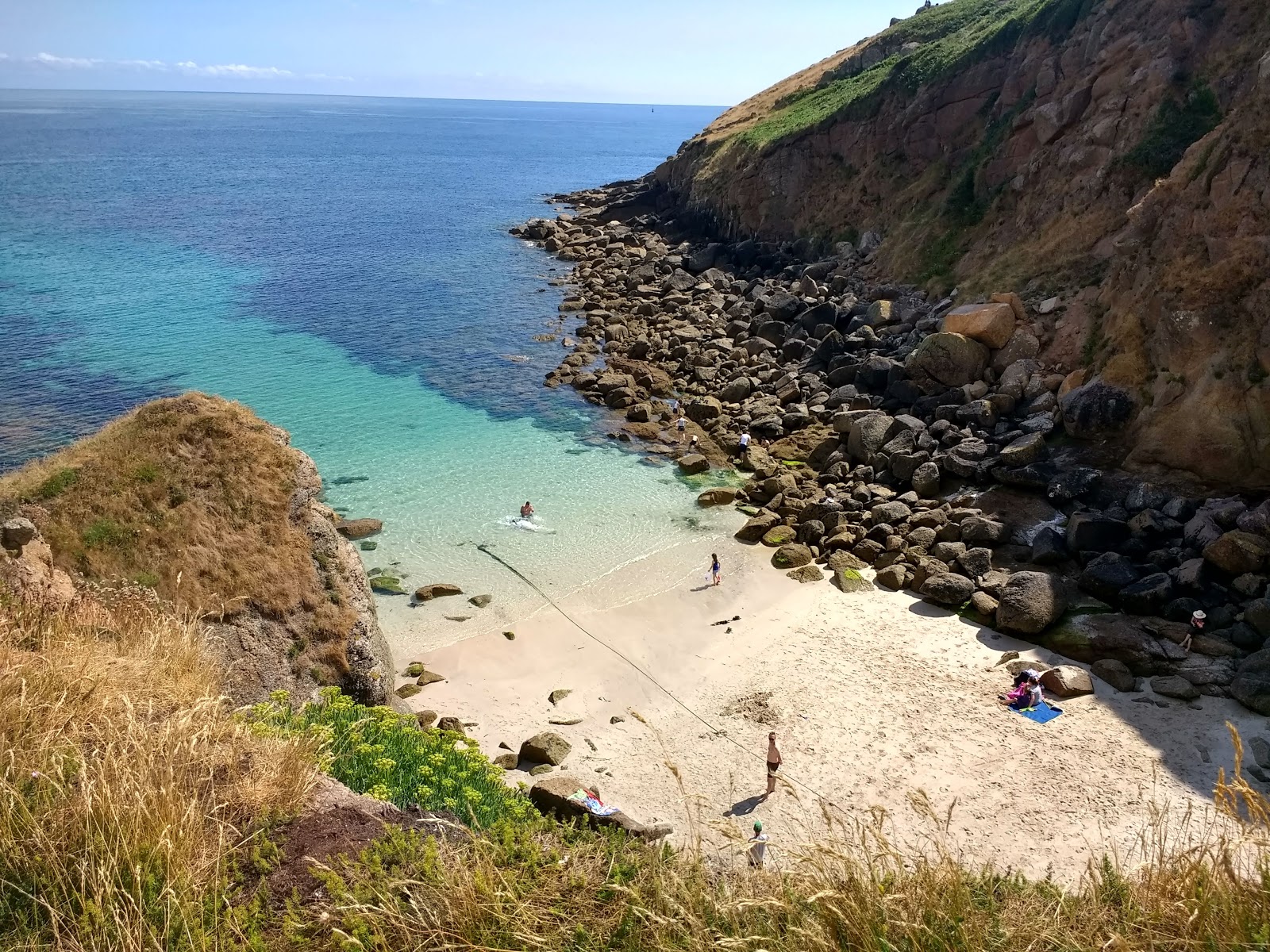 Photo of Porthgwarra beach with turquoise pure water surface