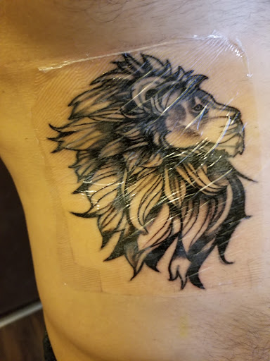 Explore mens tattoo ideas upper arm, creative tattoo ideas in Statesville, available at Light Side Tattoo & Piercings