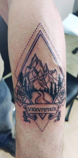 Explore sexy tattoo ideas for guys, creative tattoo ideas in Buffalo, available at CowPok Piercing Tattoo Gallery