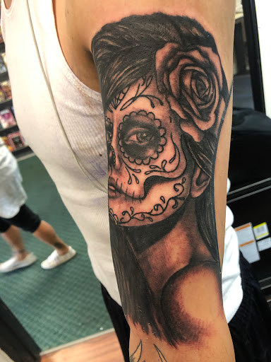 Explore grieving tattoo ideas, creative tattoo ideas in Alamosa, available at The Shop Tattoo & Comics