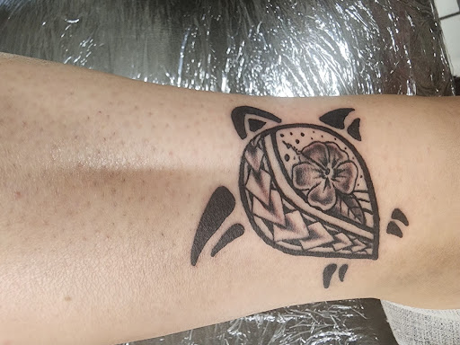 Explore punk rock tattoo ideas, creative tattoo ideas in Elkton, available at Tidewater Tattoo Studios