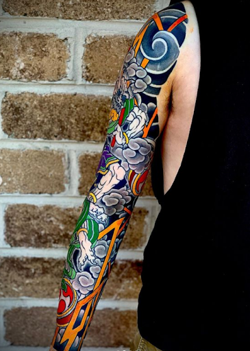 Explore dandelion tattoo ideas, creative tattoo ideas in Virginia Beach, available at Salt Water Tattoo