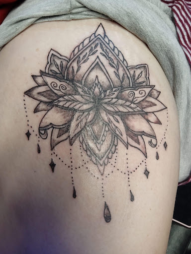 Explore tattoo ideas for spine, creative tattoo ideas in Stafford, available at Tattooz By King