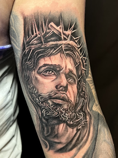 Explore mens neck tattoo ideas, creative tattoo ideas in Chicago, available at Twisted Tattoo Studio