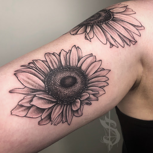 Explore tattoo ideas for crosses, creative tattoo ideas in Lopez Island, available at Soot and Bone Body Art Studio