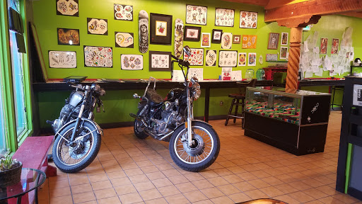 Explore free bird tattoo ideas, creative tattoo ideas in Taos, available at Muerte Tattoo Taos