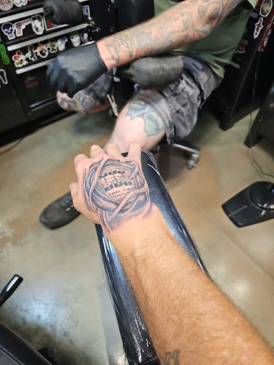 Explore back flower tattoo ideas, creative tattoo ideas in Sabetha, available at Ink Addiction