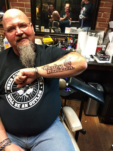 Explore forearm lion tattoo ideas, creative tattoo ideas in Jonesboro, available at Extreme Creations Tattoo Shop