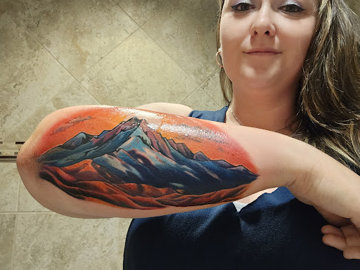 Explore arm tattoo ideas flowers, creative tattoo ideas in Peoria, available at Black Castle Art Co.