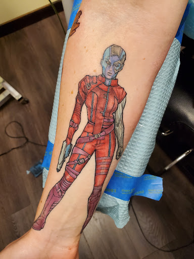 Explore cowboy hat tattoo ideas, creative tattoo ideas in Peoria, available at Guerrilla Ink Tattoos