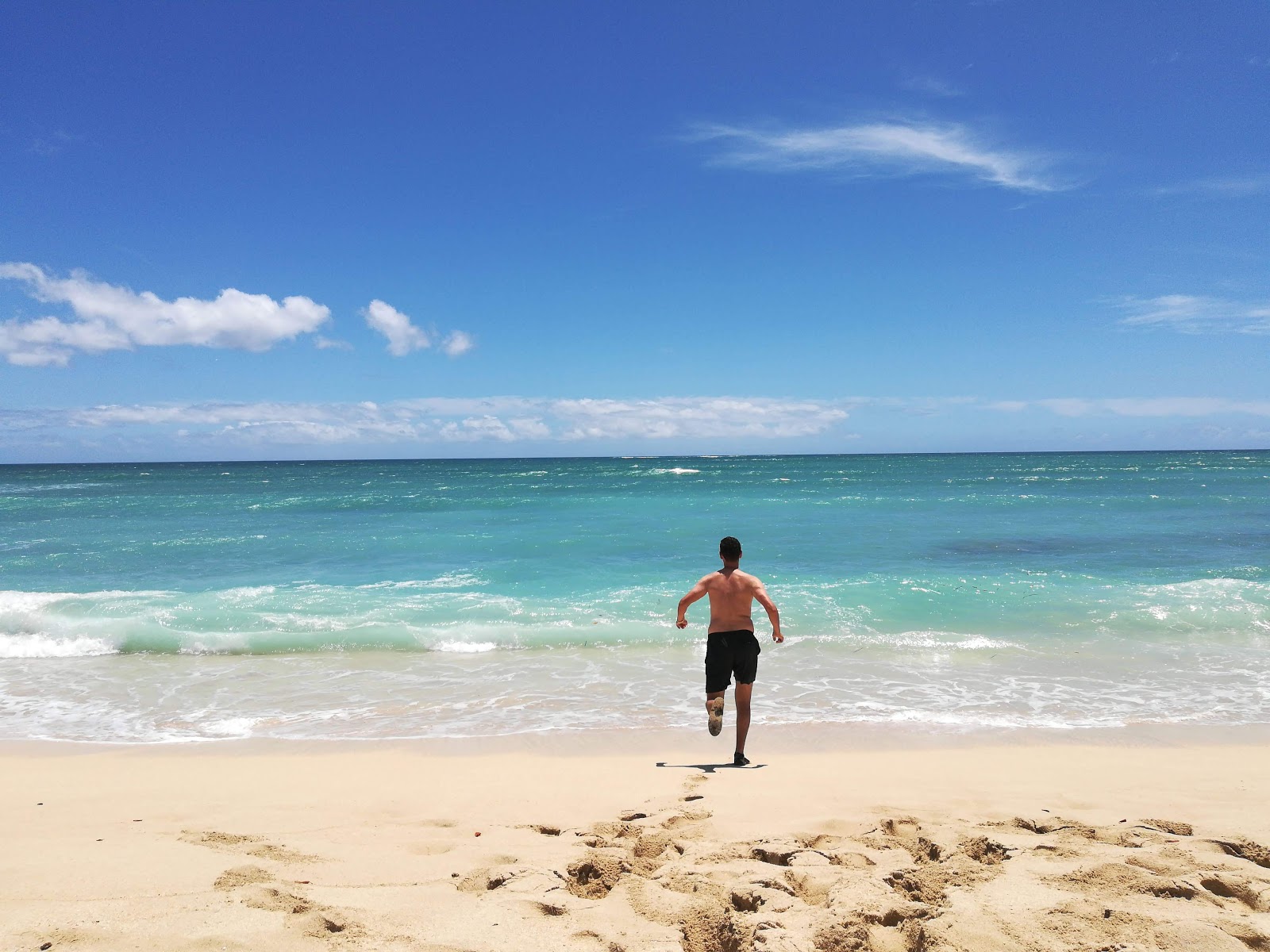 Pu'uloa Beach Park'in fotoğrafı - rahatlamayı sevenler arasında popüler bir yer