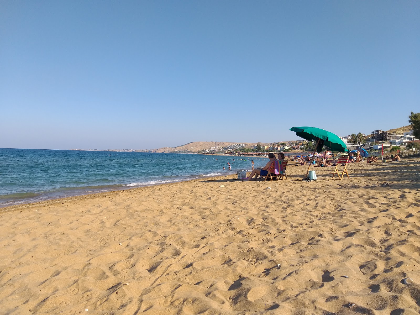 Fotografie cu Spiaggia di Via Poseidonia cu o suprafață de apa albastra