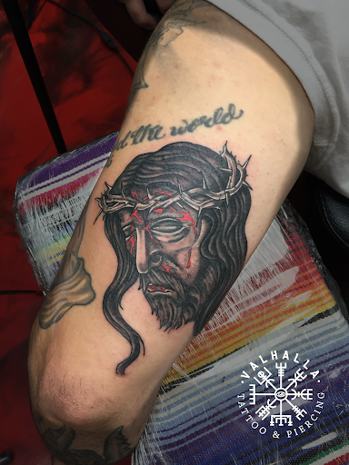 Explore minimalist tattoo ideas with meaning, creative tattoo ideas in Rogers, available at Valhalla Tattoo & Piercing Studio