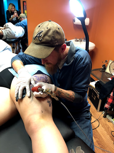 Explore star tattoo ideas for guys, creative tattoo ideas in Covington, available at Cupid Slave Tattoo Company