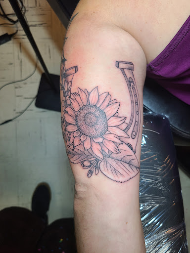 Explore tattoo cover up ideas, creative tattoo ideas in Meadville, available at Lucky Lucys Tattoo and Art Studio