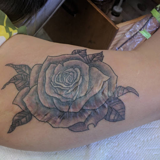 Explore emperor's new groove tattoo ideas, creative tattoo ideas in Victorville, available at Doctor Inks Tattoo Clinic