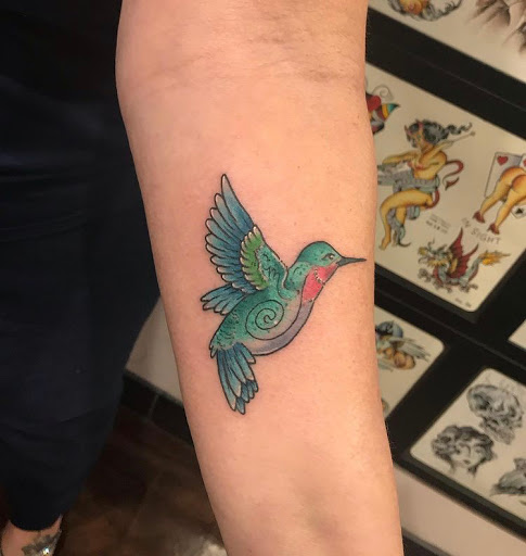 Explore bow tattoo ideas, creative tattoo ideas in Libertyville, available at Lucky Seven Tattoo