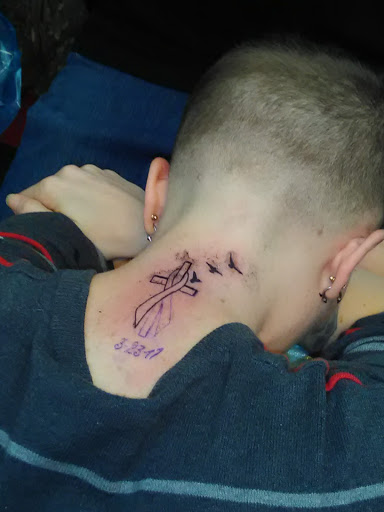 Explore daisy tattoo ideas, creative tattoo ideas in Lansing, available at Ink & Needle South