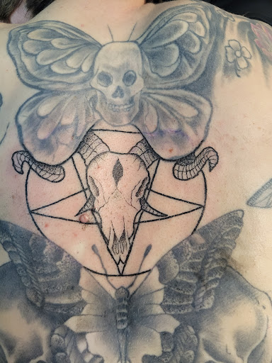 Explore lower sleeve tattoo ideas, creative tattoo ideas in Fort Worth, available at Twisted Ink