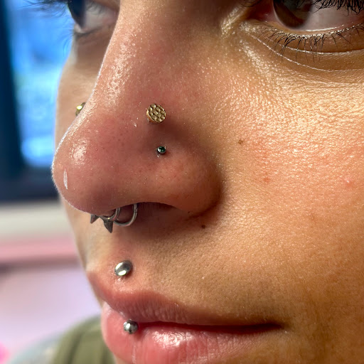 Explore cool face tattoos ideas, creative tattoo ideas in Memphis, available at Rose Quartz Body Adornment LLC