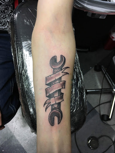 Explore half sleeve cover up tattoo ideas, creative tattoo ideas in Kearney, available at Bread N Butter Tattoo