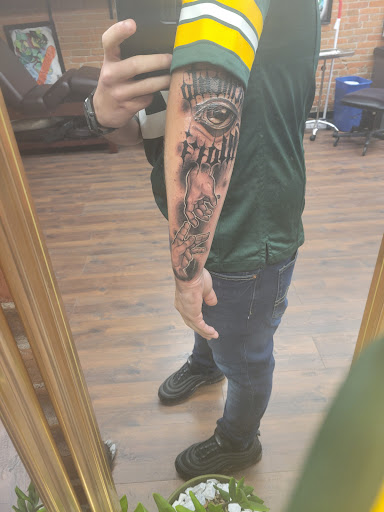 Explore cosmic tattoo ideas, creative tattoo ideas in Dubuque, available at Grim River Tattoo