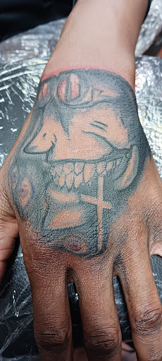 Find tattoo ideas joker for your next unique tattoo in Green Bay at SPITFIRE CREATIONS