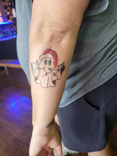 Explore halloween tattoo ideas for men, creative tattoo ideas in Orlando, available at Good Vibrations Ink Tattoo and Body Piercing