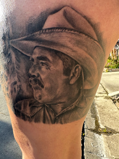 Explore middle neck tattoo ideas, creative tattoo ideas in San Marcos, available at FROSTY TATTOO STUDIO