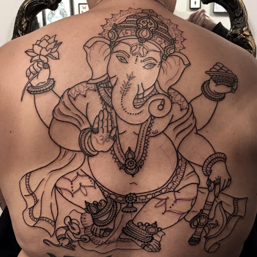 Explore taurus tattoo ideas for females, creative tattoo ideas in Scipio Center, available at Ace of Wands Private Tattoo & Tarot Studio . Appointment Only