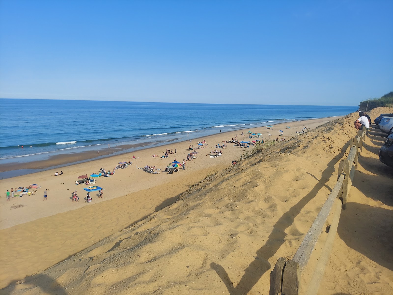 Fotografie cu Cahoon Hollow beach cu o suprafață de apa turcoaz