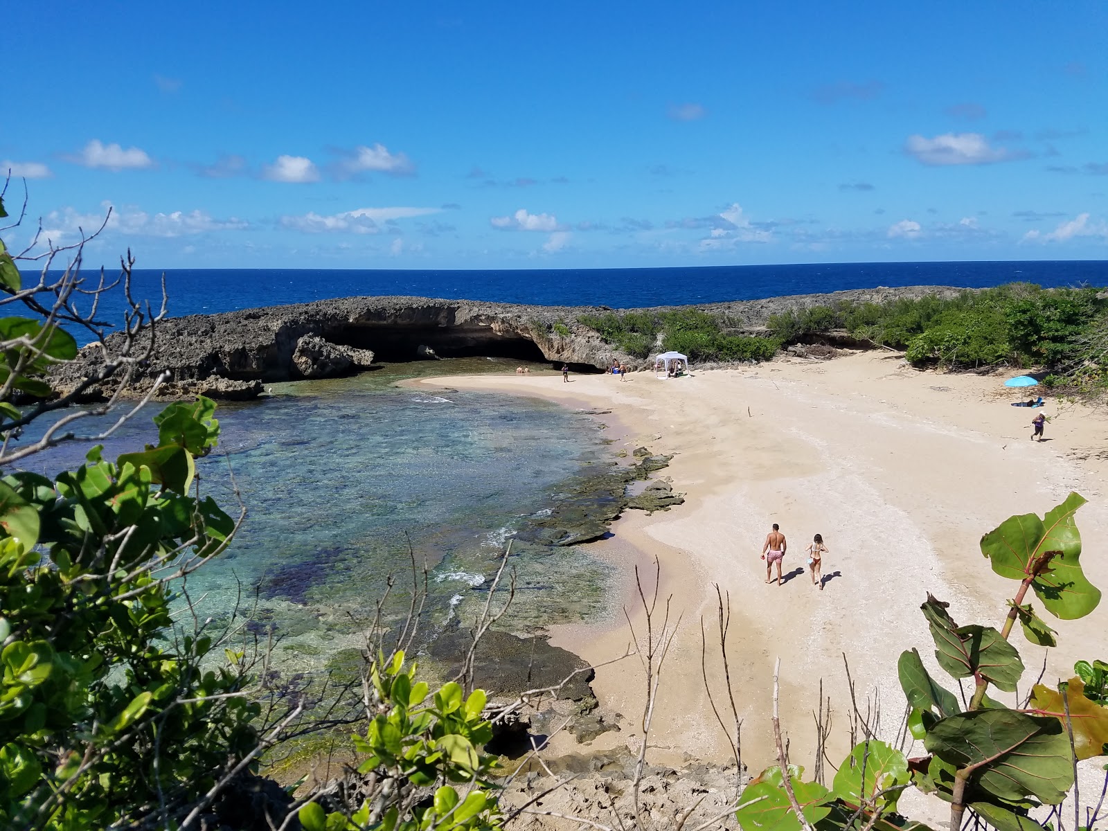 Photo of Las Golondrinas beach with bright sand surface