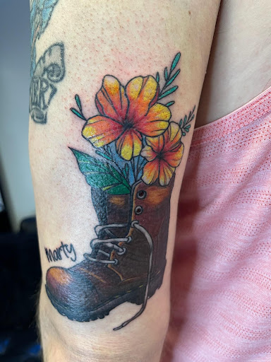 Explore tattoo flower sleeve ideas, creative tattoo ideas in Broomfield, available at Wild Child Tattoo