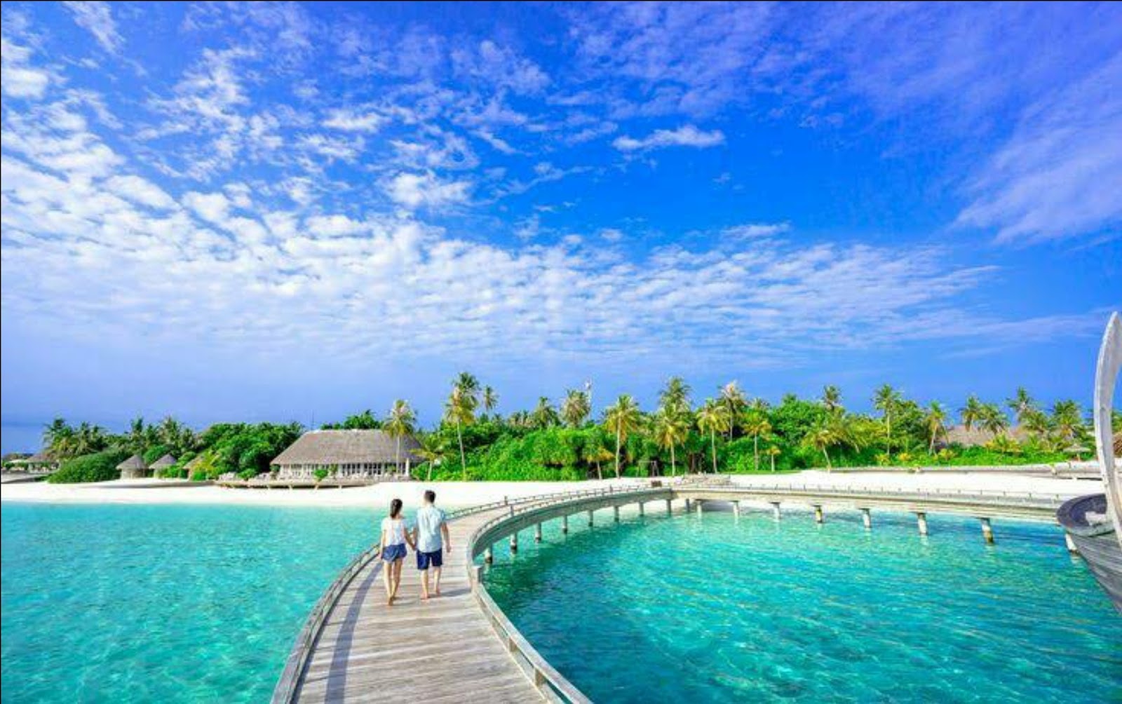 Foto von Milaidhoo Island Strand mit türkisfarbenes wasser Oberfläche