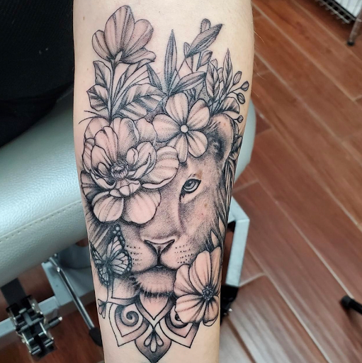 Explore bear sleeve tattoo ideas, creative tattoo ideas in Toledo, available at 4 Nineteen Ink