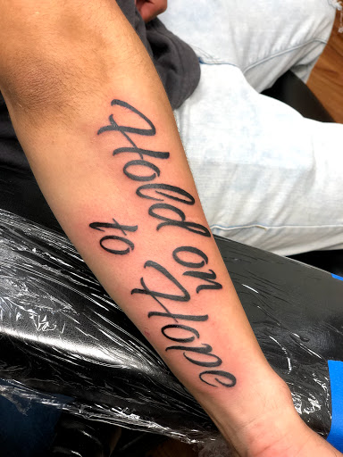 Find cool armband tattoo ideas for your next unique tattoo in Amarillo at Tattoo Spa LLC