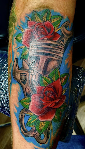 Explore ripped tattoo ideas, creative tattoo ideas in Birmingham, available at Heavily Tatted