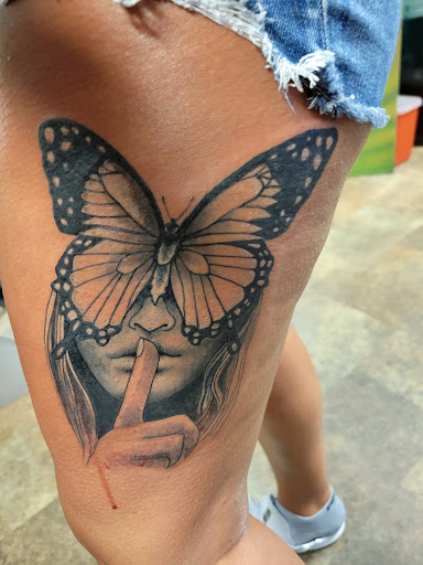 Explore black and grey half sleeve tattoo ideas, creative tattoo ideas in Fort Oglethorpe, available at Wicked Eyes Tattoo Art Gallery