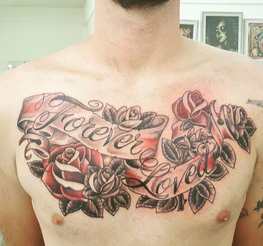 Explore ideas for chest tattoos men, creative tattoo ideas in Owensboro, available at Lady Luck Tattoo and Body Piercing