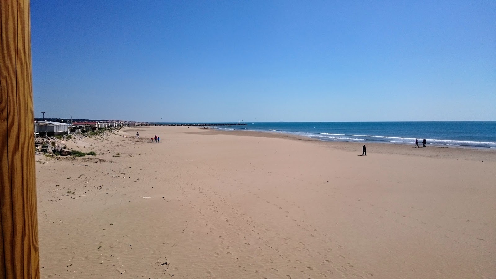 Foto von Plage de Mateille mit feiner beiger sand Oberfläche