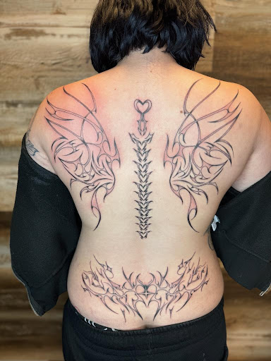 Explore cyber y2k tattoo ideas, creative tattoo ideas in Biloxi, available at Artisan Ink Studio