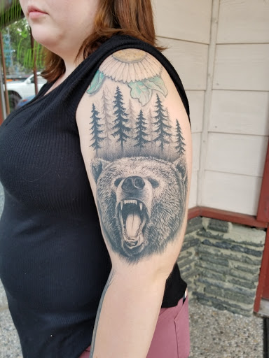 Explore thigh tattoo ideas for women, creative tattoo ideas in Bellingham, available at Beluga Palooza Tattoo