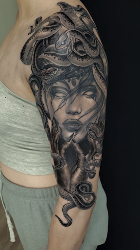 Explore armband tattoo ideas for men, creative tattoo ideas in Kansas City, available at A1 Tattoo Co